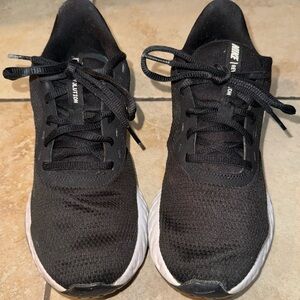Nike Womens Black and White Athletic Shoes size 9